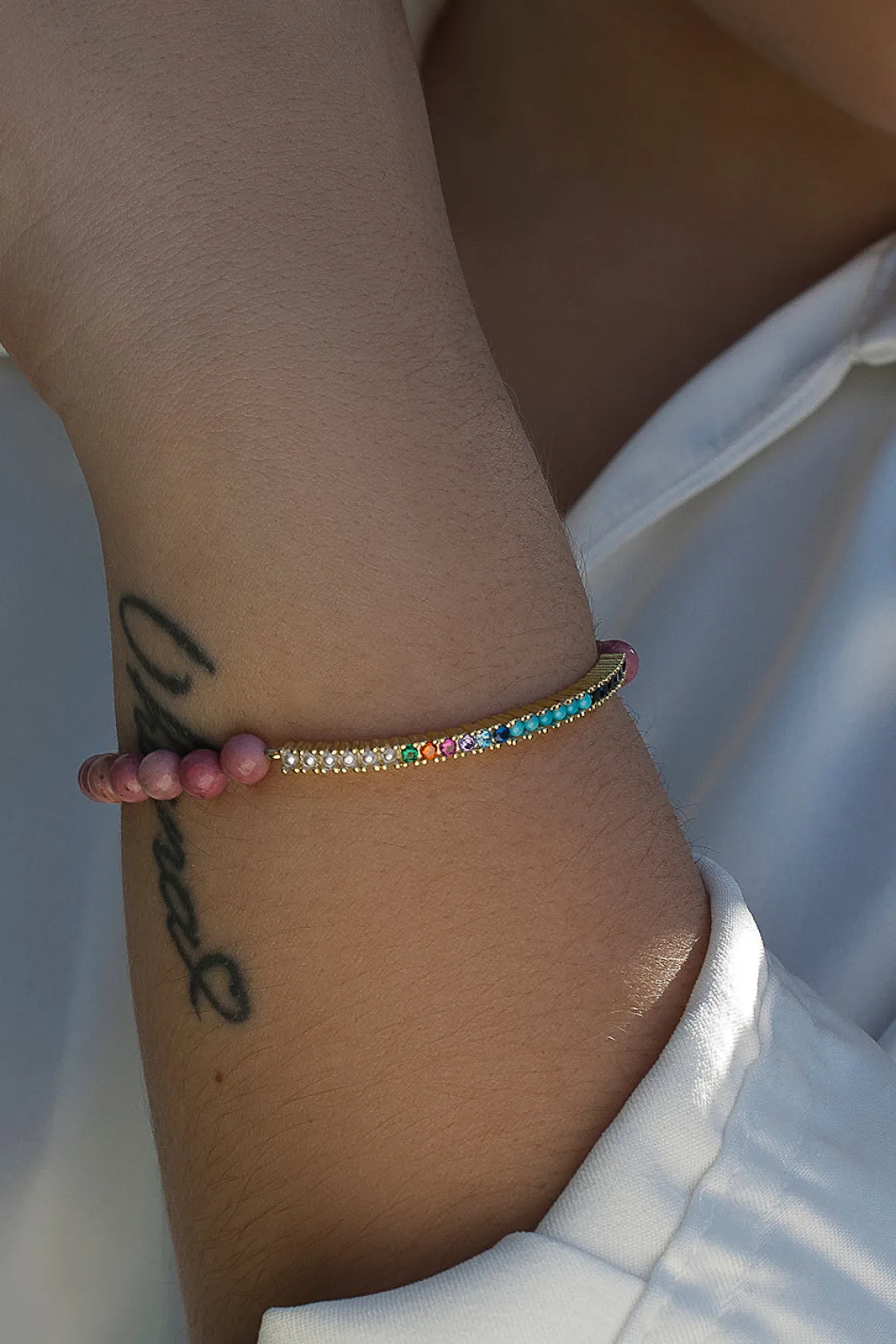 Pulsera De Bolas | Pulseras Con Piedras | LINEARGENT Pulseras de bolas en tonos rojizos con cenefa compuesta por perlas circonitas y bolas pequeñas